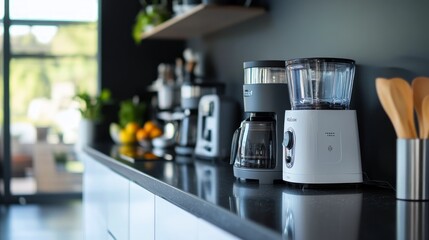 A modern kitchen countertop featuring various appliances for food and drink preparation.
