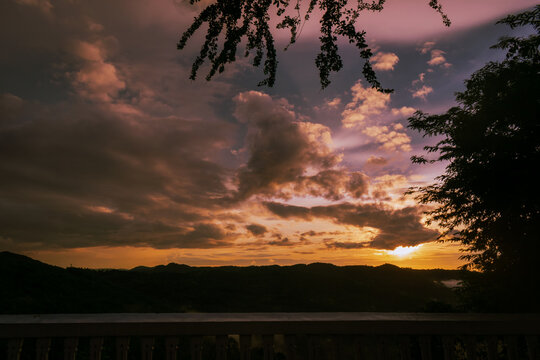 Cebu, Philippines. August 23, 2024. Golden sunrise at the Guadalupe Carcar Highway - GCH