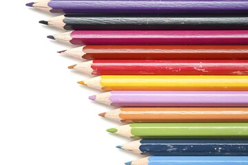 Close up shot of colorful pencils isolated on white background