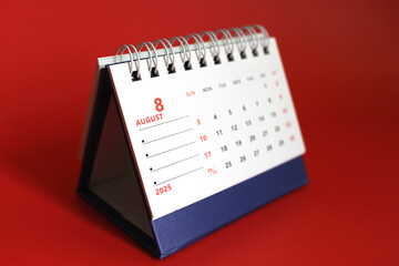 Monthly calendar template for the new year 2025 desk calendar,on red background