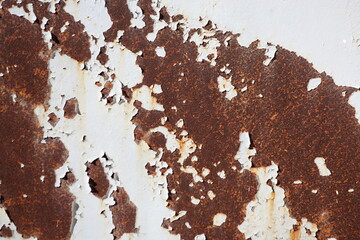 close up of painted metal surface. peeling paint