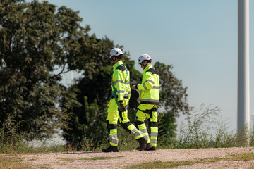 The engineering and technical team is preparing to install a large wind turbine to convert wind energy into electricity