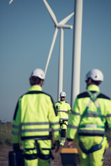Fototapeta premium The engineering and technical team is preparing to install a large wind turbine to convert wind energy into electricity