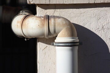 drainage plastic pipes on the wall
