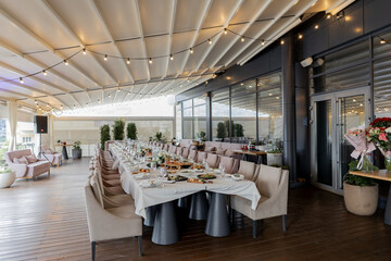 banquet hall in a restaurant with decor for a wedding