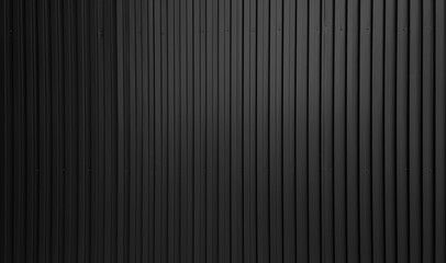 Obraz premium real black chrome corrugated metal sheet wall showing vertical pattern, bolts, screw. modern industrial dark black metal sheet wall facade. wide surface of aluminum wall texture use for design.
