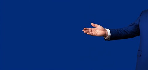 Professional man's hand extended on blue background, inviting and engaging in a conversation.