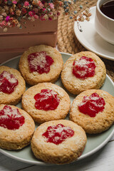 Cookies with tea on a light table