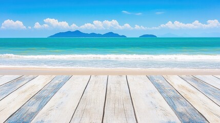 Fototapeta premium A wooden table overlooking the ocean with an island in the distance and a bright blue sky, creating a peaceful and scenic view.