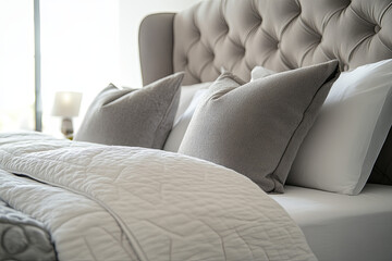 Elegant upholstered bed frame with clean lines on a white background