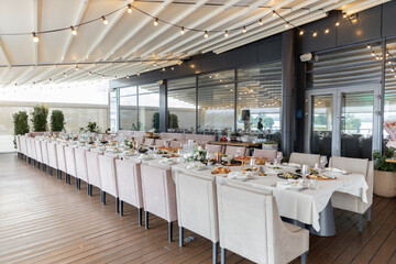 banquet hall in a restaurant with decor for a wedding