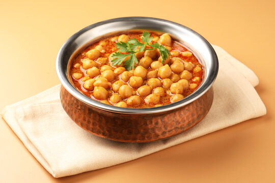 Chole or Chick pea curry  served in a copper bowl