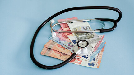 Increasingly expensive medicine, private medicine, stethoscope and the euro banknotes.