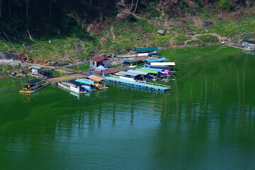 Fototapeta premium floating restaurant complex on Telaga Menjer, Wonosobo.