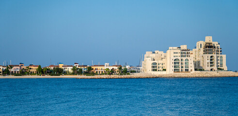 The Limassol Marina with yachts and beautiful buildings in Cyprus