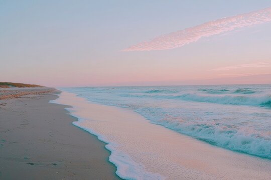 Tranquil Beach at Sunset with Soft Pink Sky and Gentle Waves - Powered by Adobe