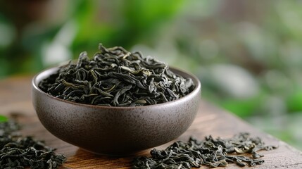 Fototapeta premium Green Tea Leaves in Bowl.