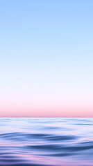 Obraz premium tranquil pastel ocean scene with gentle waves and serene sky creates calming atmosphere. soft colors blend beautifully, evoking peace and relaxation