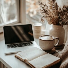 A cozy workspace with laptop coffee and notebooks surrounded by nature's beauty