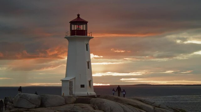 Stunning Timelapse Of Peggy's Cove Lighthouse At Dusk, Capturing The Dramatic Movement Of Clouds Over The Rocky Atlantic Coastline Near Halifax, Nova Scotia, Canada.