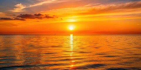 Obraz premium Sun setting over the horizon casting a warm orange glow on the sky and water , sunset, sun, horizon, glow, orange, sky, water
