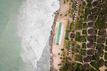 Birds view of the ocean crashing onto the cliff, Bayahibe Beach, Dominican Republic