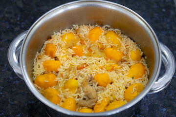 Traditional Brazilian dish rice, chicken and pequi (caryocar brasileinse) known as galinhada goiana