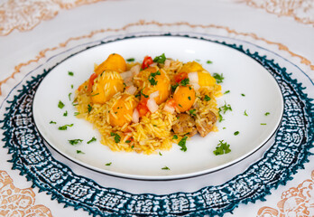 Traditional Brazilian dish rice, chicken and pequi (caryocar brasileinse) known as galinhada goiana