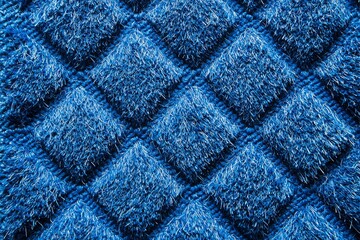 Fototapeta premium Close-up of a Blue Fabric with a Textured Pattern