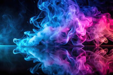 Obraz premium Aerial clouds of colorful smoke in blue and purple neon light swirling on black table background with reflection