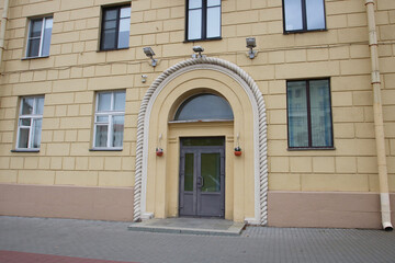 The entrance to a building featuring a decorative rope archway