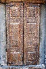 Old wooden carved door. Khiva. Uzbekistan