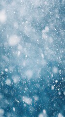 Obraz premium Winter Snowfall: Abstract Blue Background with Falling Snowflakes