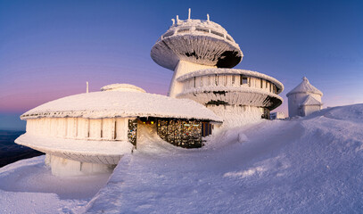 architecture on Sniezka peak during winter dusk in Karkonosze mountains in Poland