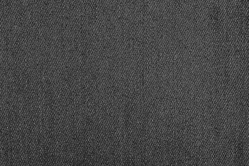 The texture of black jeans as a background.
