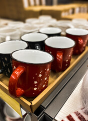 Shelf with New Year's goods in the store. New Year's gnomes, Christmas decorations, figurines of Christmas trees. New Year and Christmas concept