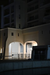 Fototapeta premium The Limassol Marina at Night with yachts and beautiful buildings in Cyprus 