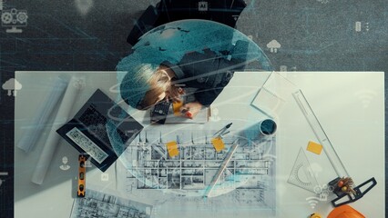 Architect engineer working while working on laptop with sticky notes and calculator to design building construction. Smart manager working and using calculator with global connection. Alimentation.