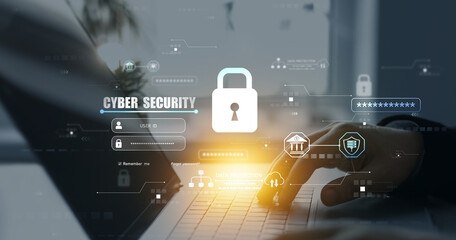 Person using laptop with digital padlock shield.Cyber security protection concept.Data protection...