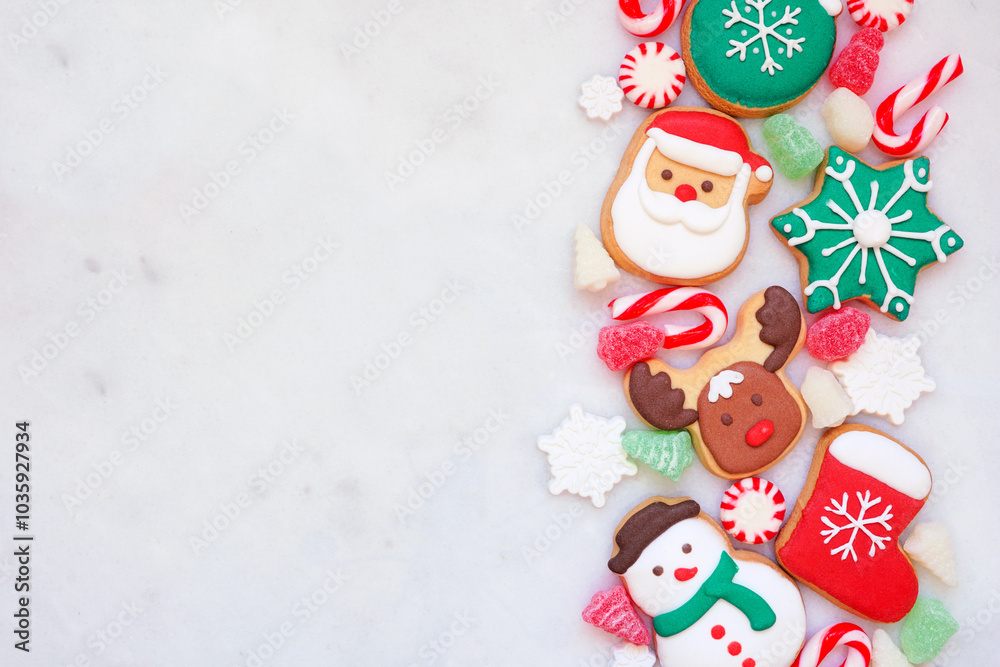 Poster cute colorful christmas cookie side border on a white marble background with copy space. top down vi