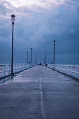 Jetty in a stormy day. Pier in the Alcochete village in Portugal