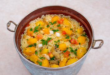 Traditional Brazilian dish rice, chicken and pequi (caryocar brasileinse) known as galinhada goiana