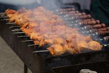 Meat kebabs on coals. Cooking meat outdoors.