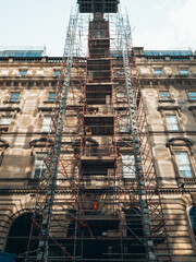 An old building covered with scaffolding