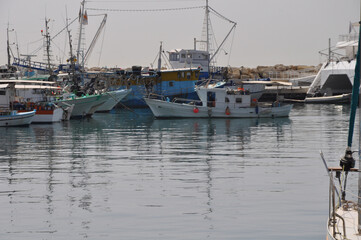 The Limassol Old Port with fishing boats and beautiful buildings in Cyprus