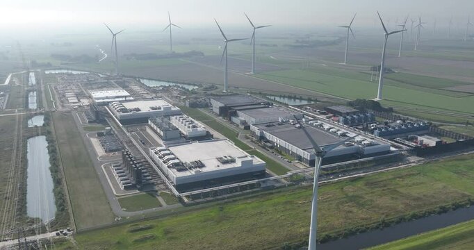 Large search engines company data center in the Eemshaven, Groningen, The Netherlands. Aerial droen video