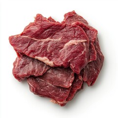 Fototapeta premium Fresh raw beef steak slices stacked on white background for culinary preparation