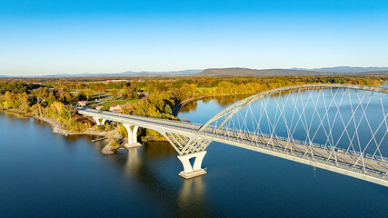 Aerial view of Lake Champlain Bridge, spanning the serene lake and connecting Crown Point, New York to Vermont.