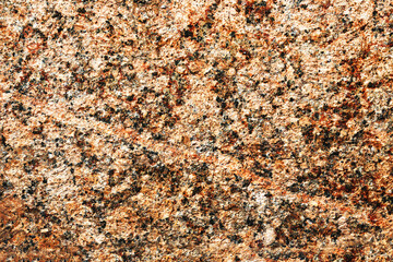 The surface of a large granite stone.