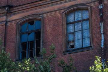 industrial background, windows of abandoned vintage factory building